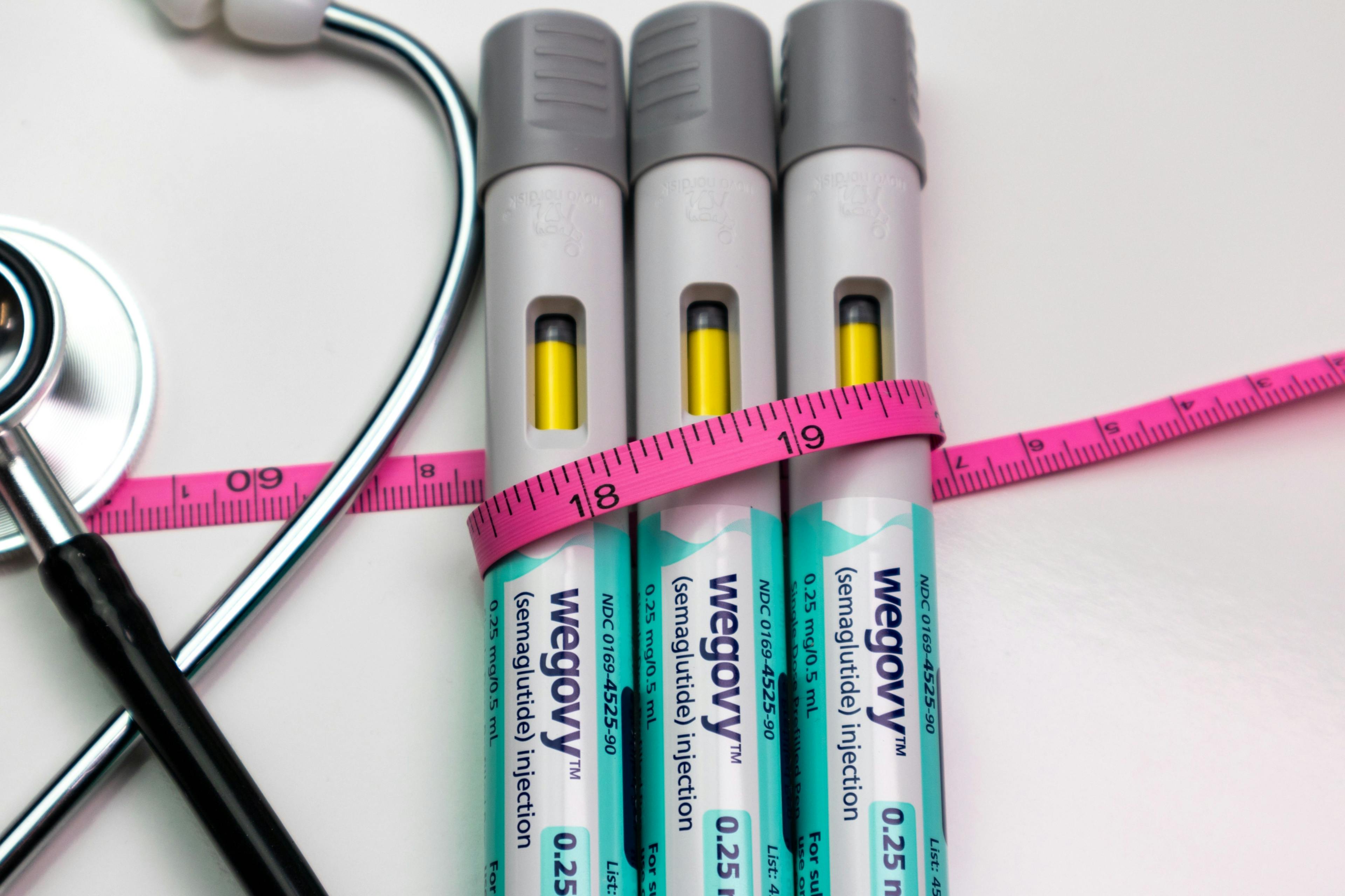 Wegovy pens with tape measure and stethoscope  | Image credit: © K KStock stock.adobe.com