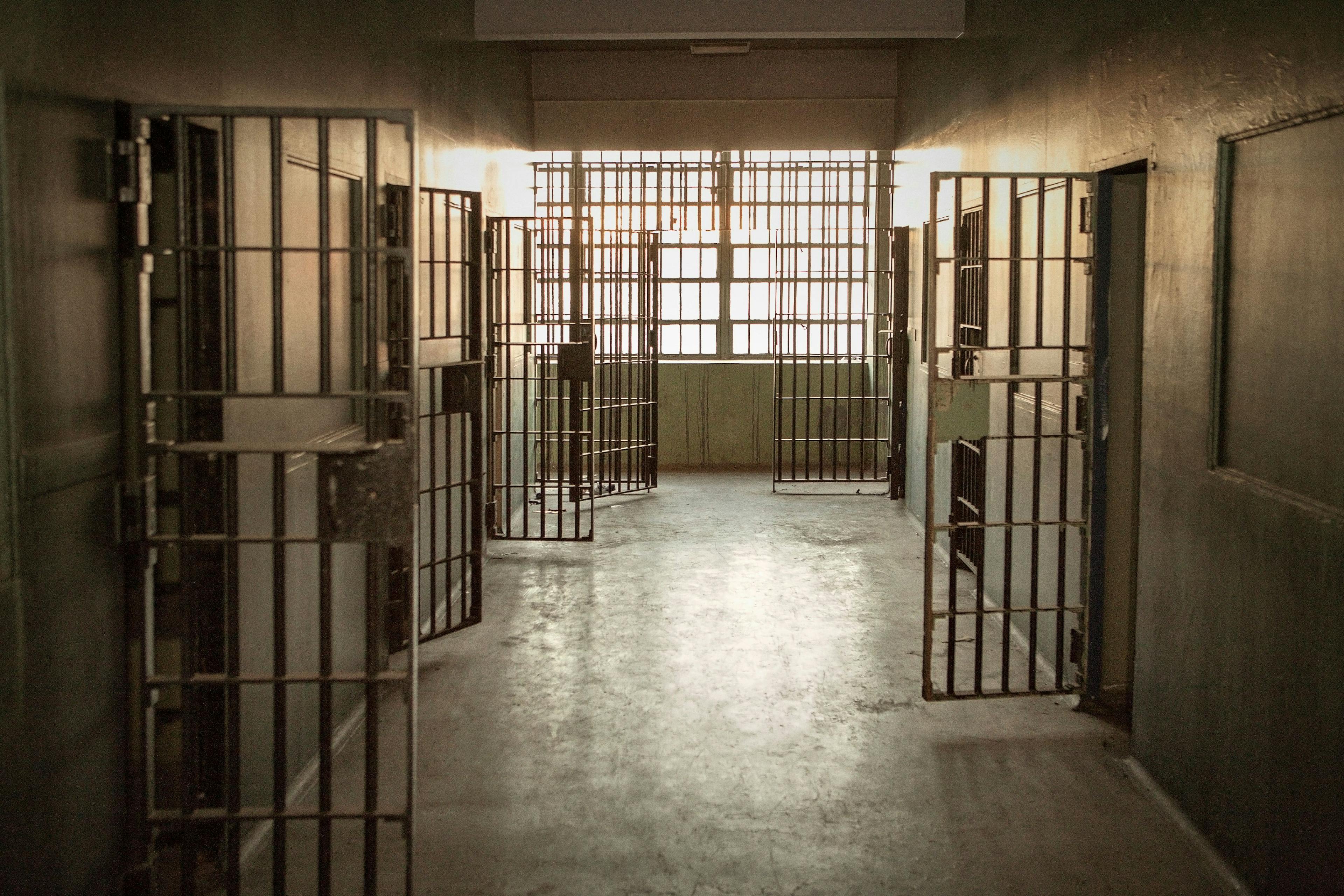 inside of prison with doors of cells open | Imaged credit: ©Cavan for Adobe stock.adobe.com
