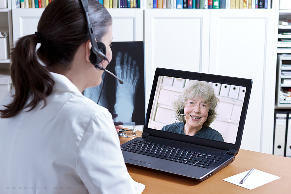 Doctor in telehealth call with patient